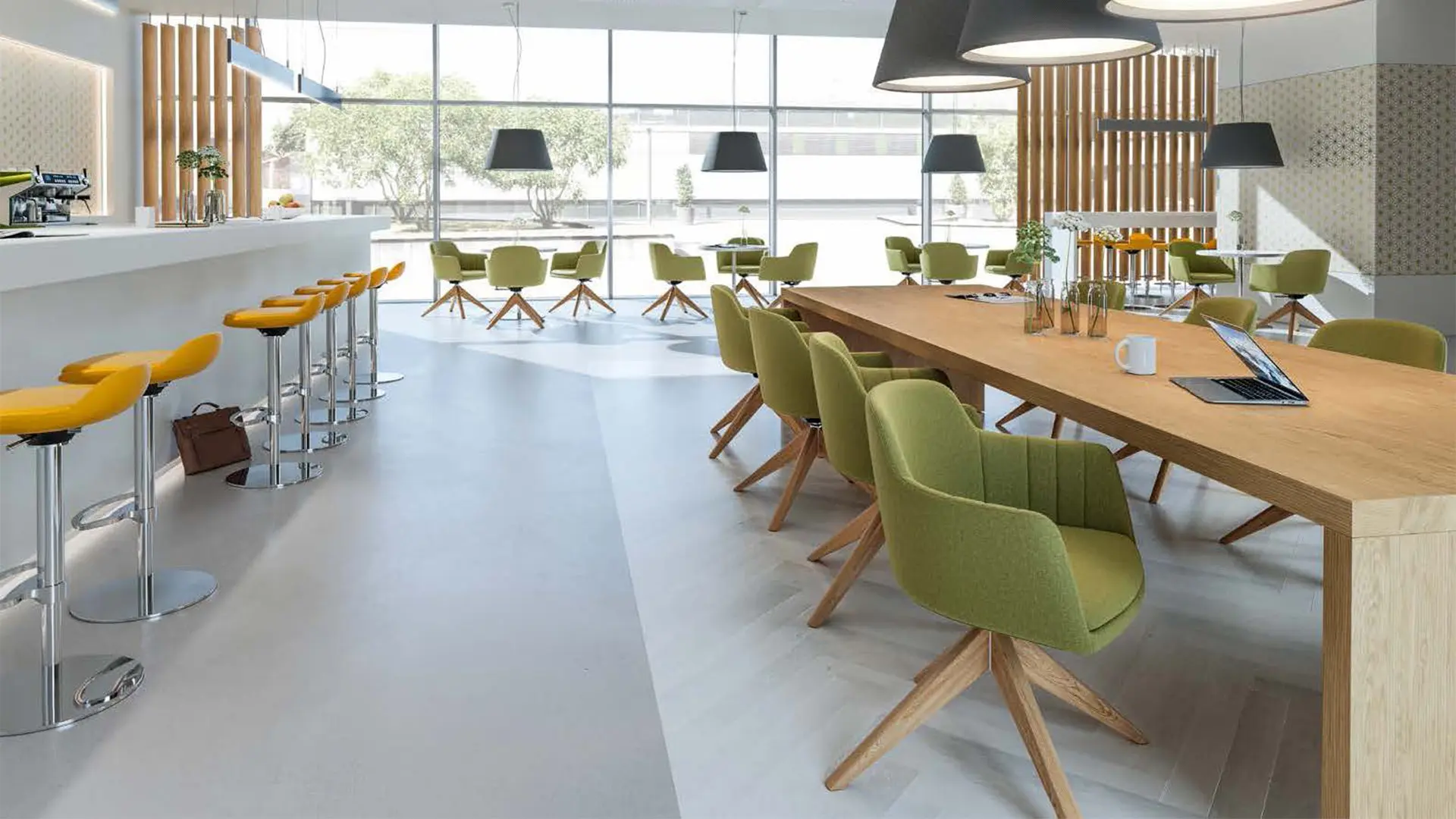 Coffice equipado con mobiliario de Interstuhl, diseñado para fomentar la comunicación y colaboración entre colaboradores.