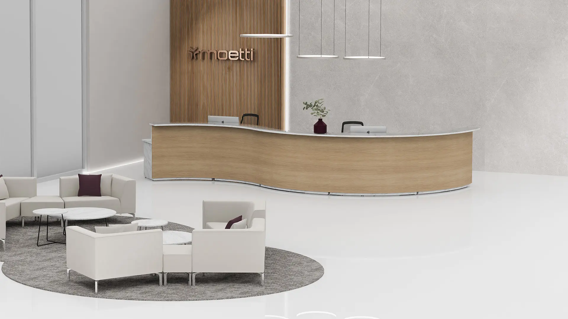 Recepción equipada con mobiliario de Moetti Escarlata, diseñada para ofrecer comodidad y calidez en espacios corporativos.